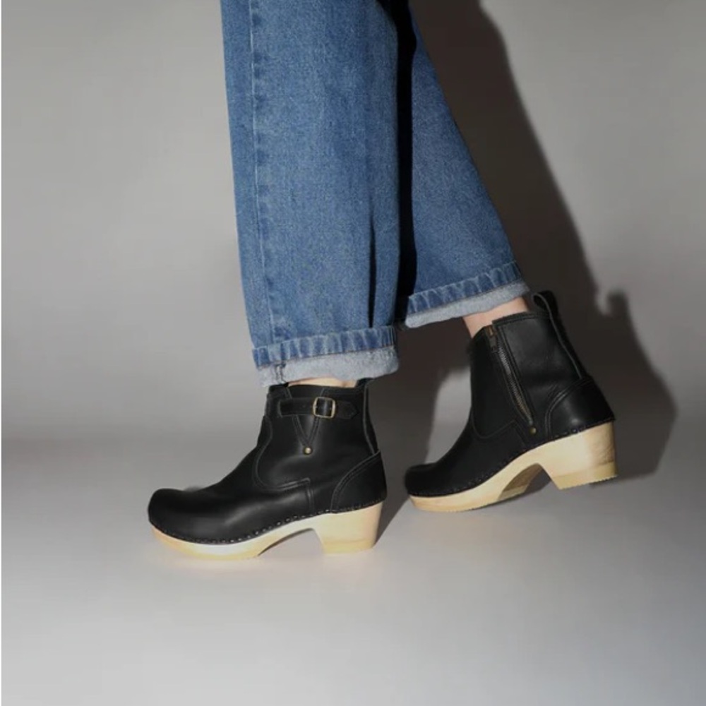 No. 6 5 inch leather clog buckle boot on mid heel in black. Size 40